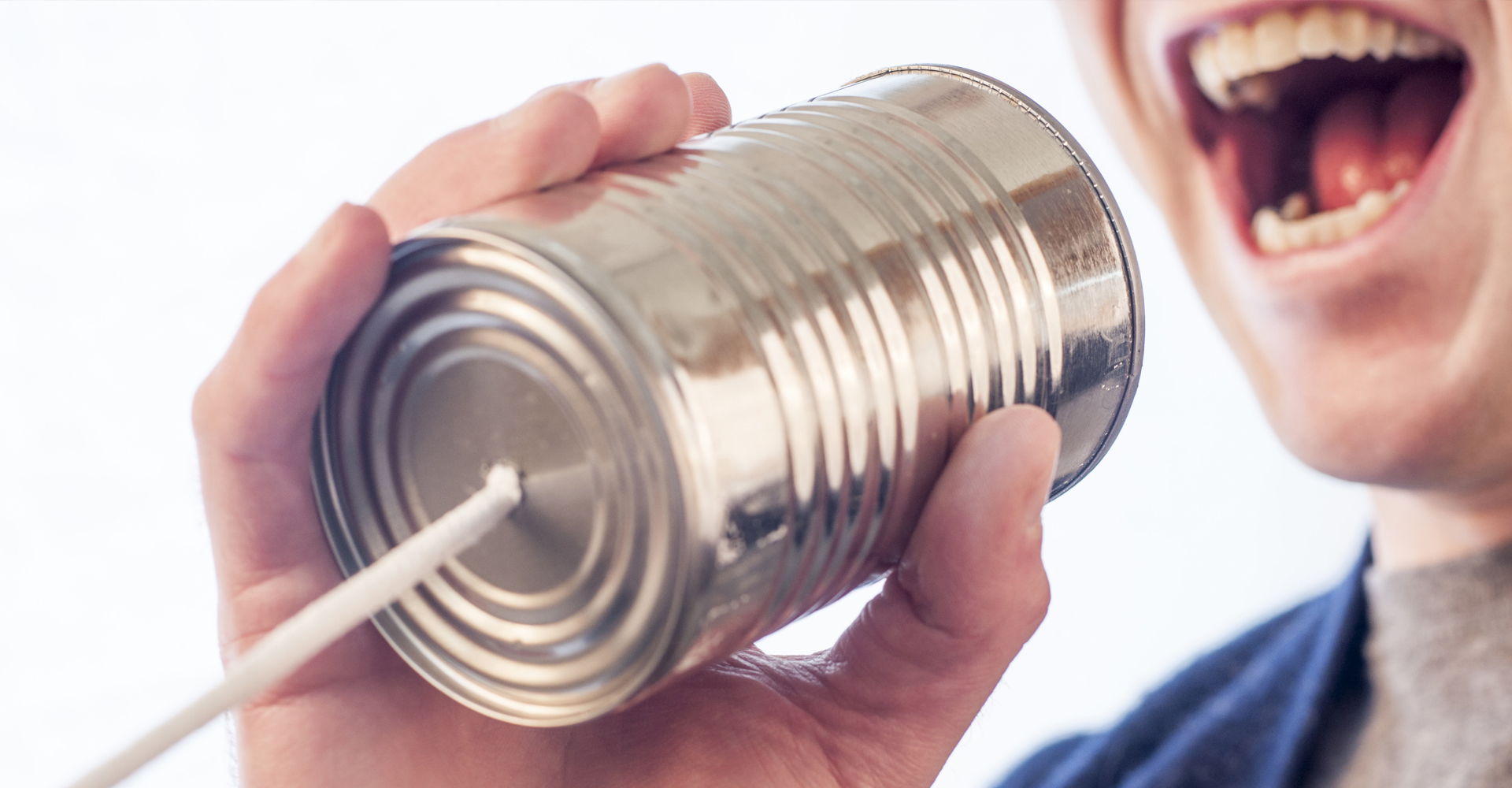 talking into a tin can phone